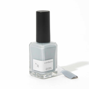 Non-toxic nail polish in muted gray